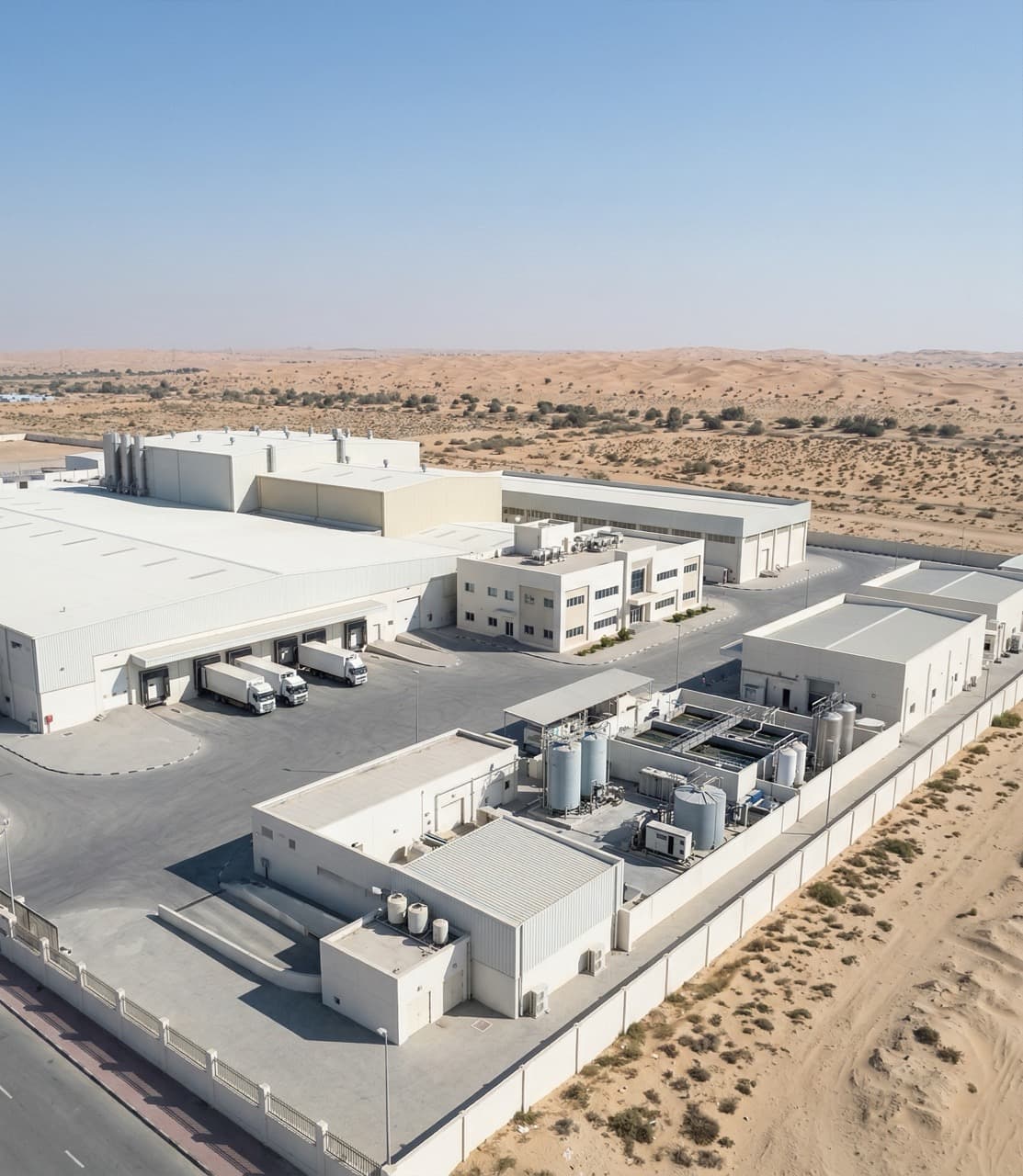 Modern food processing facility in GCC Middle East desert environment requiring Vision 2030 compliant waste treatment