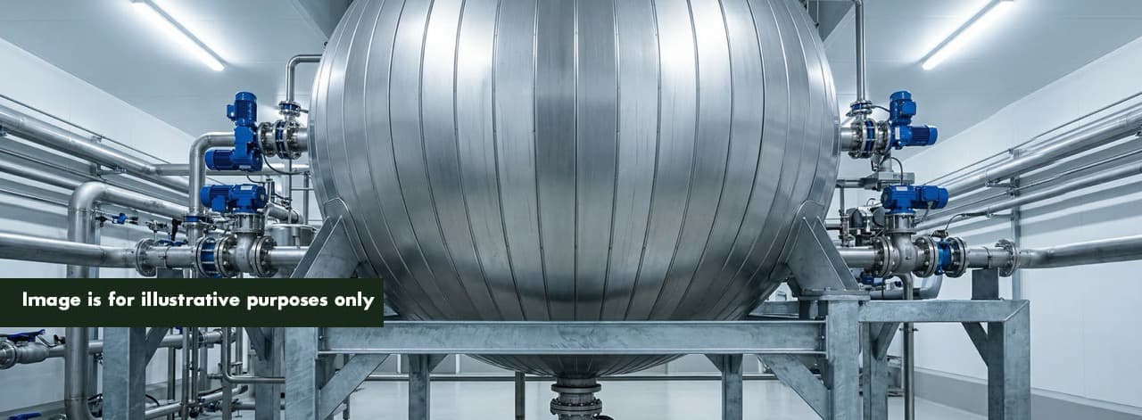 PHANTOM spherical subcritical water hydrolysis pressure vessel on a clean factory floor — the on-site treatment system that eliminates landfill tax, EPR disposal fees, incineration gate fees, and generates verified Scope 3 Category 5 data per cycle.